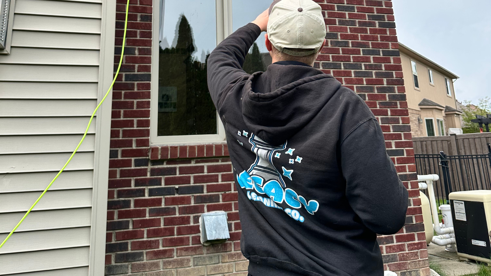 Window cleaning on a historic home in the village of Romeo, MI